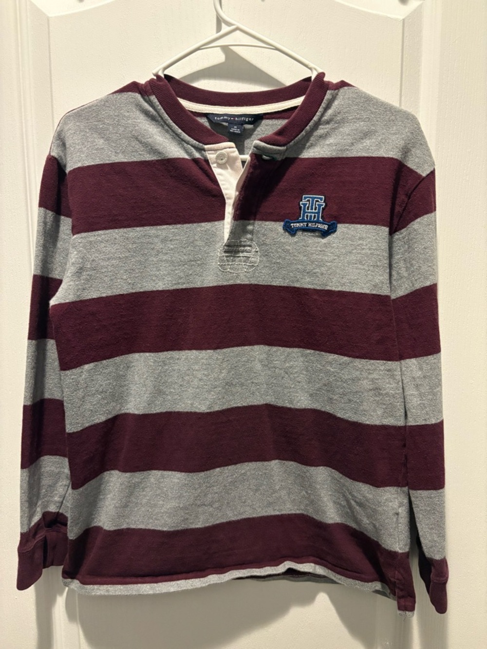 Tommy Hilfiger grey and burgundy striped long-sleeve rugby polo shirt.